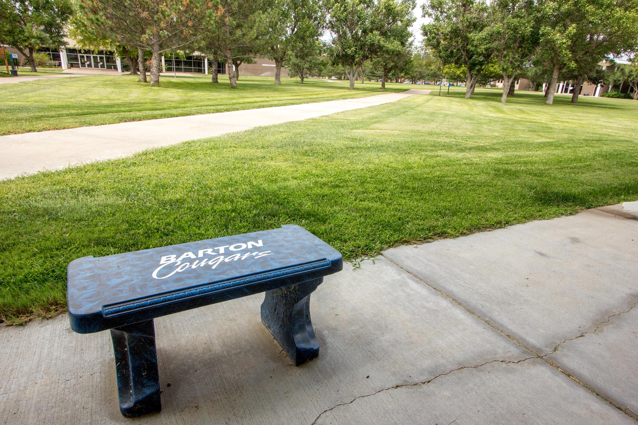 Barton Cougars bench on campus