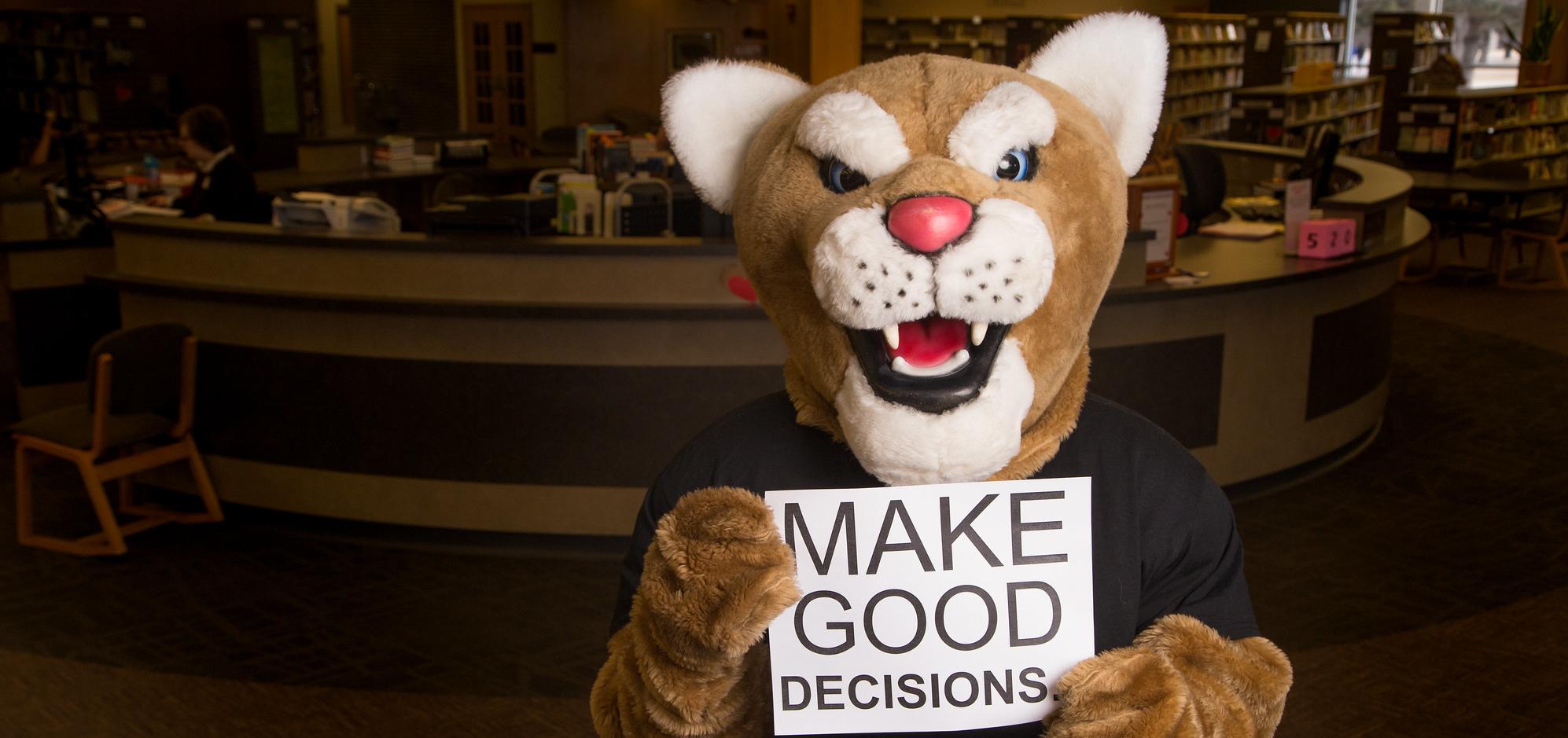 Bart holds a sign saying Make Good Decisions